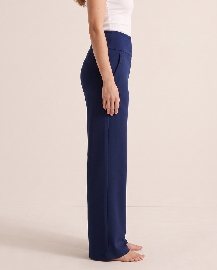 Pantalon taille haute à jambe large bleu, vue de profil